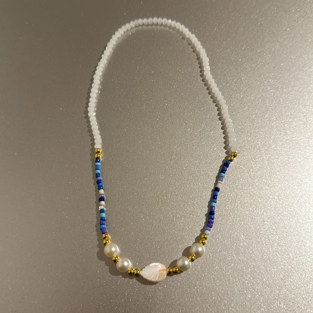 Chic Blue and White Beaded Necklace with Gold Accents
